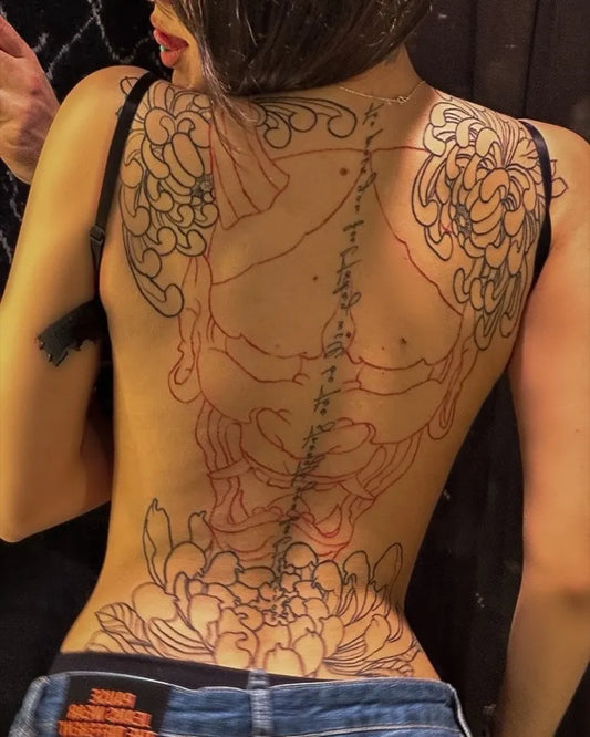 Big Japanese Skull Flowers on Women Back Tattoo by @one_million._tattoos