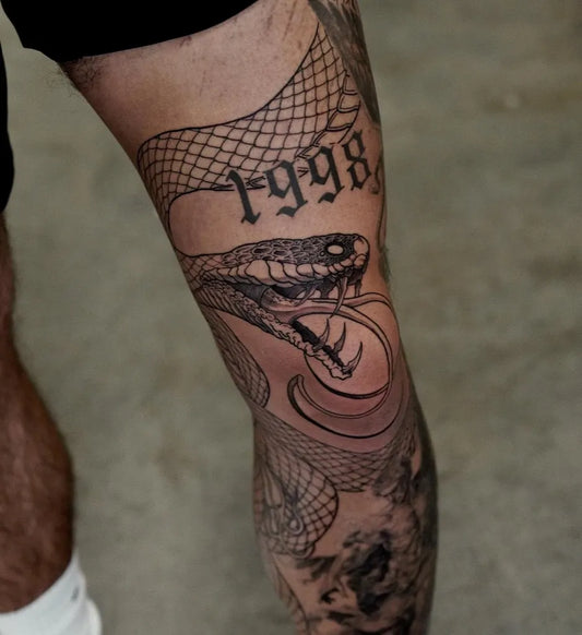 Big Japanese Snake with 1998 on Men Leg Tattoo by @gary.tattooer