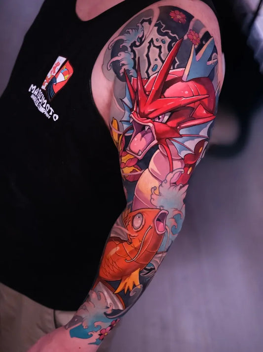 Big Japanese Style Gyarados Magikarp on Men Arm Tattoo by @harleytattooartist