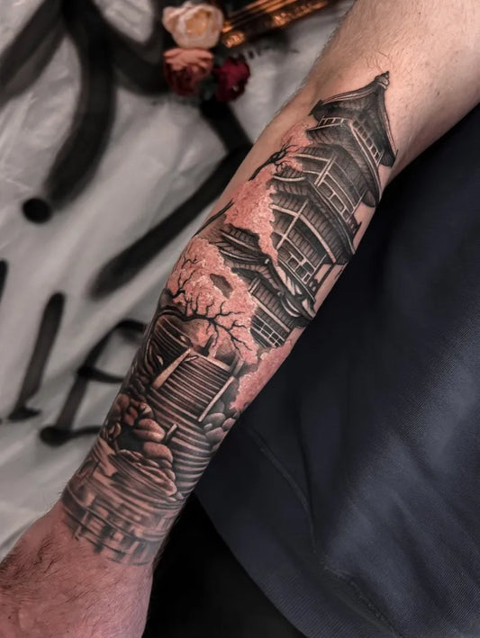 Big Japanese Style Pagoda and Cherry Blossoms on Men Arm Tattoo by @vean_tattoo_den_haag