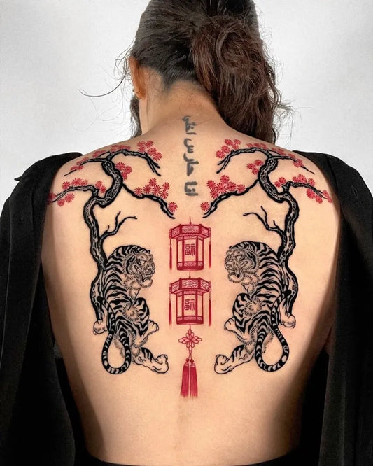 Big Japanese Tigers and Cherry Blossoms on Women Back Tattoo by @irezumiartist