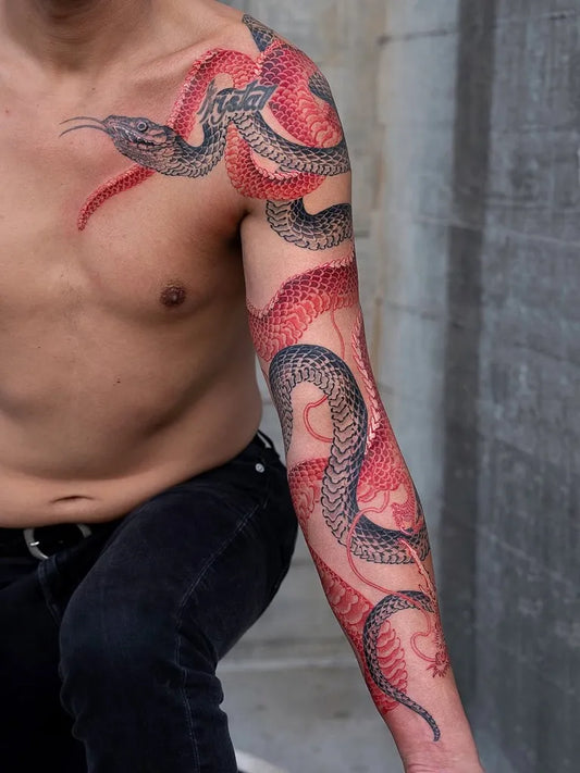 Big Japanese Twin Snakes Skull on Men Arm Tattoo by @tattoosfolder
