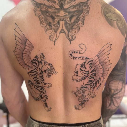 Big Japanese Winged Tigers on Men Back Tattoo by @cursed_teddy_tats