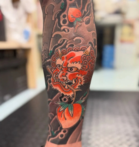 Big JapaneseHannya Mask Peaches Waves on Men Leg Tattoo by @wakatomo_tattoo