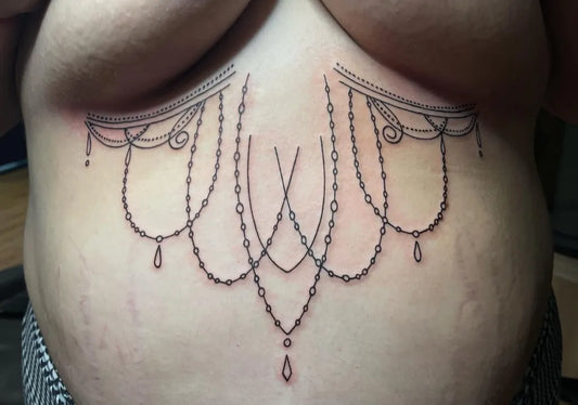 Big Lace Chains on Women Sternum Tattoo by @paola_venegass