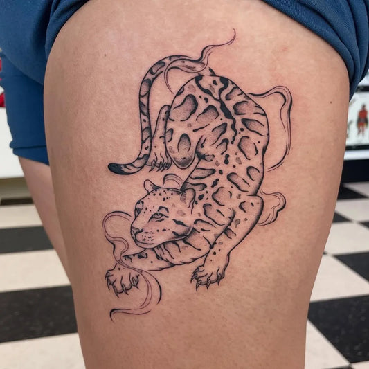 Big Leopard Style Leopard with Smoke on Women Thigh Tattoo by @skylerkingtattoo