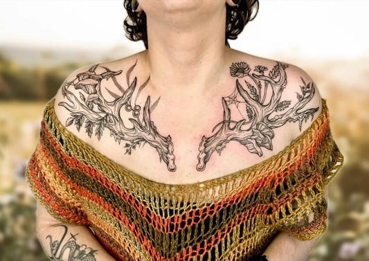 Big Linework Deer Antlers with Flowers on Women Chest Tattoo by @uprooted_ink