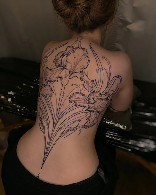 Big Linework Iris Flowers on Women Back Tattoo by @pip.fox.tattoos