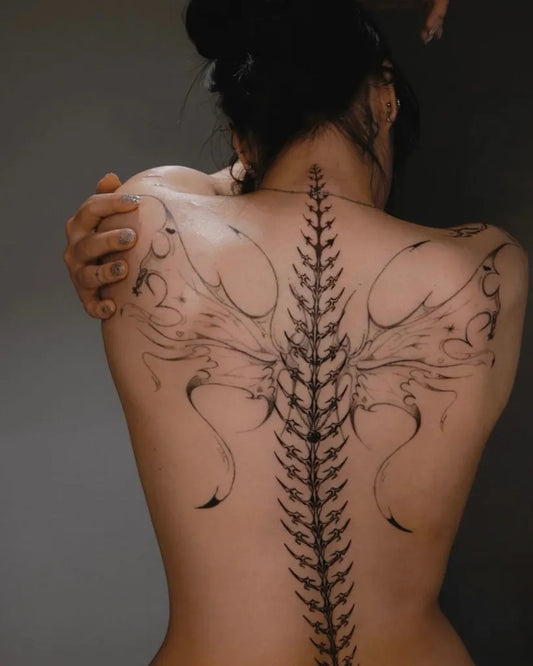 Big Linework Spine Wings on Women Back Tattoo by @block03studio