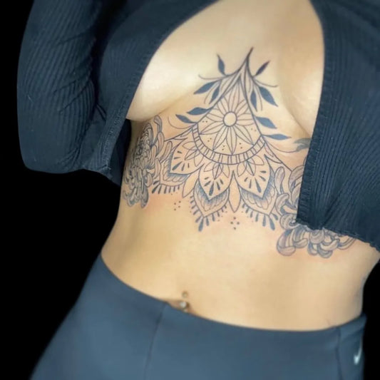 Big Mandala Flower on Women Sternum Tattoo by @holdfasttattoolbk