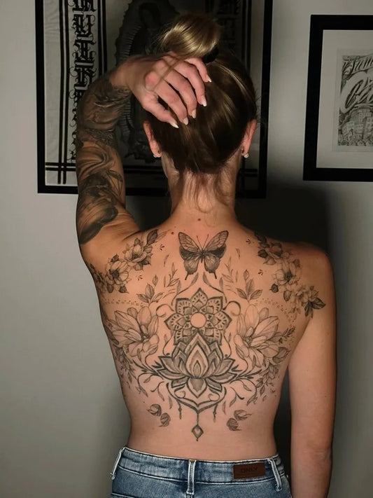 Big Mandala Lotus Butterflies on Women Back Tattoo by @patricialeggotattoo