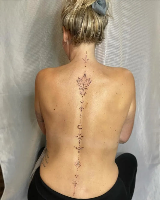 Big Mandala Lotus Crescent on Women Spine Tattoo by @sophiespoonertattoo