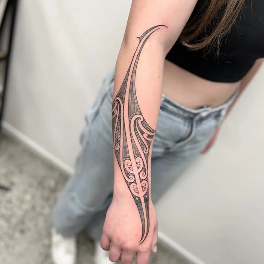 Big Maori Curved Patterns on Women Forearm Tattoo by @otautahitattooqueenstown