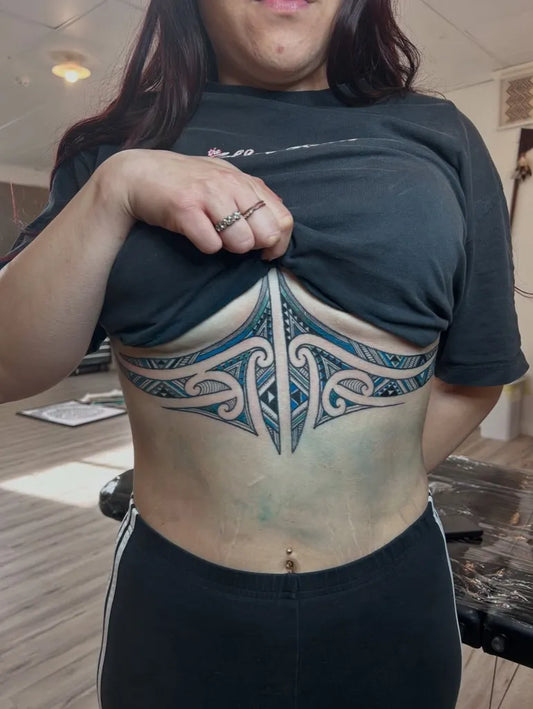 Big Maori Tribal Koru on Women Sternum Tattoo by @toituakiri