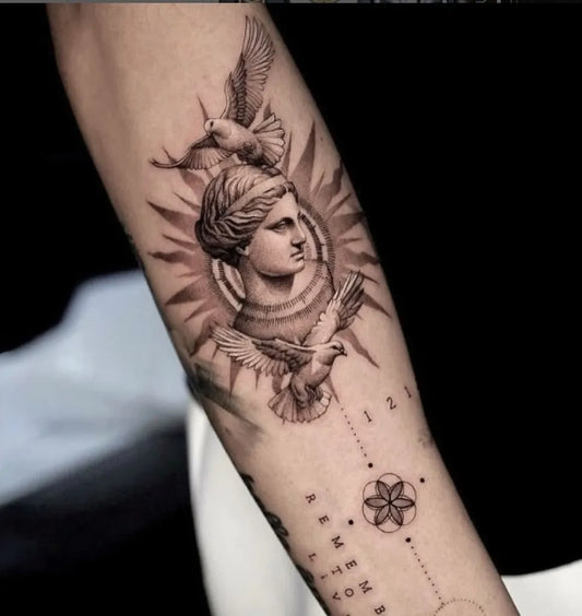 Big Micro Realism Aphrodite with Doves and Sunburst on Women Arm Tattoo by @inkedlifemiami