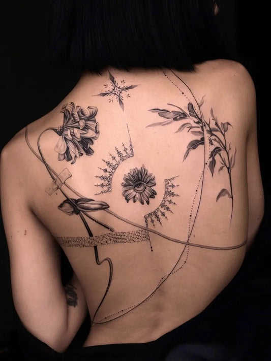 Big Minimalist Floral Lines on Women Back Tattoo by @has.tats