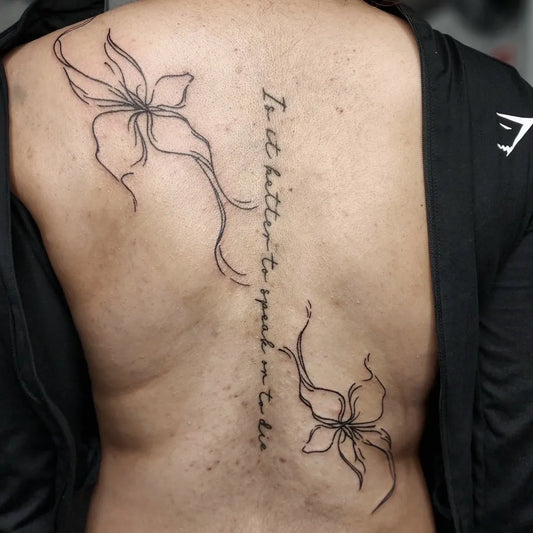 Big Minimalist Flowers and Quote on Women Back Tattoo by @joaotatz