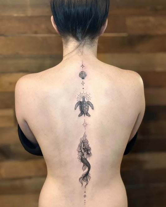 Big Minimalist Turtle Mermaid on Women Spine Tattoo by @tattooafterlife