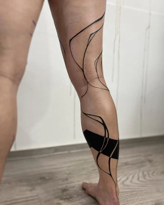 Big Negative Space Abstract Lines Tattoo on Women Thigh by @sanne_vaghi