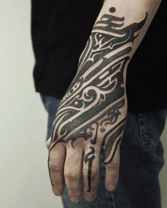 Big Negative Space Blackwork Tribal Pattern Tattoo on Men Forearm by @scene360