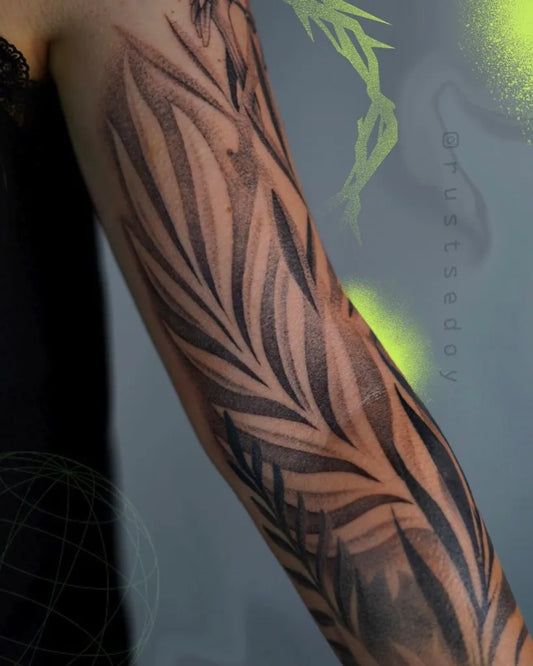 Big Negative Space Feather Tattoo on Women Arm by @rustsedoy