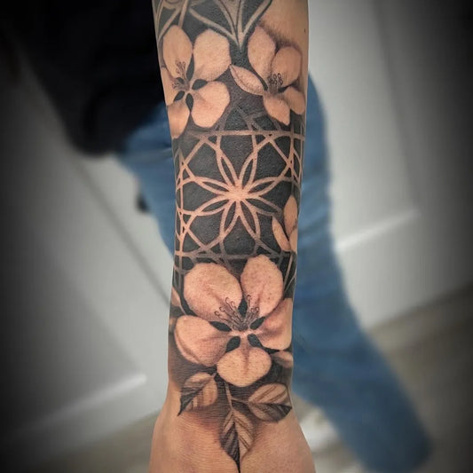 Big Negative Space Sacred Geometry Dogwood Flowers Tattoo on Men Arm by @rocky_esparza_tattoos