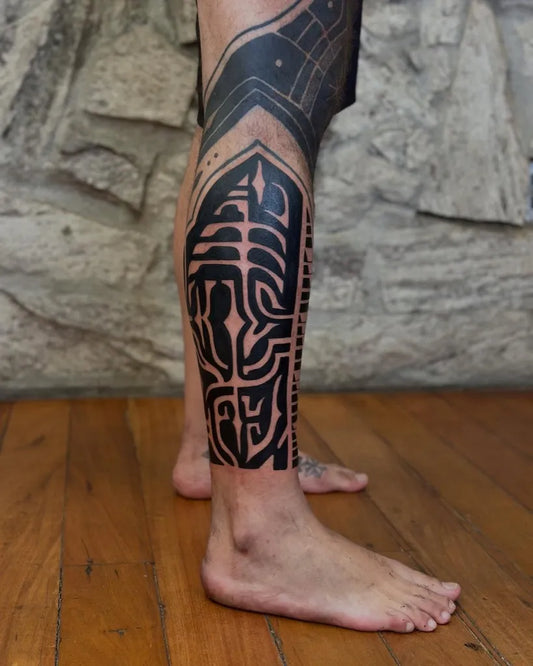 Big Negative Space Tribal Patterns Tattoo on Men Leg by @aurim.ra