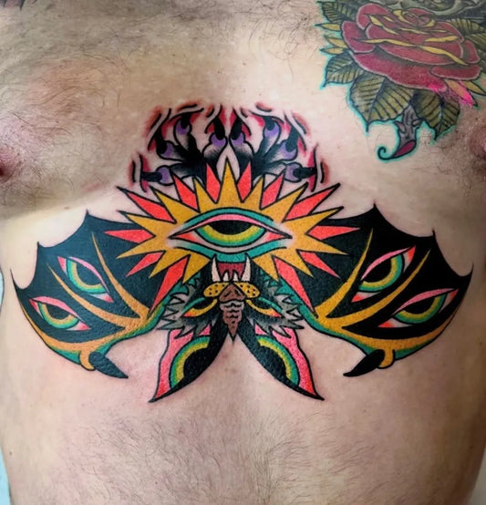 Big Neo Traditional Bat Eye Sun Tattoo on Men Chest by @controltattoo