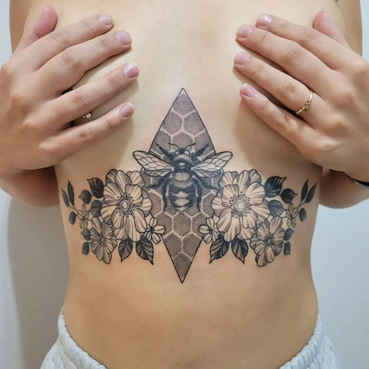 Big Neo Traditional Bee and Flowers on Women Sternum Tattoo by @little.mustard.ink