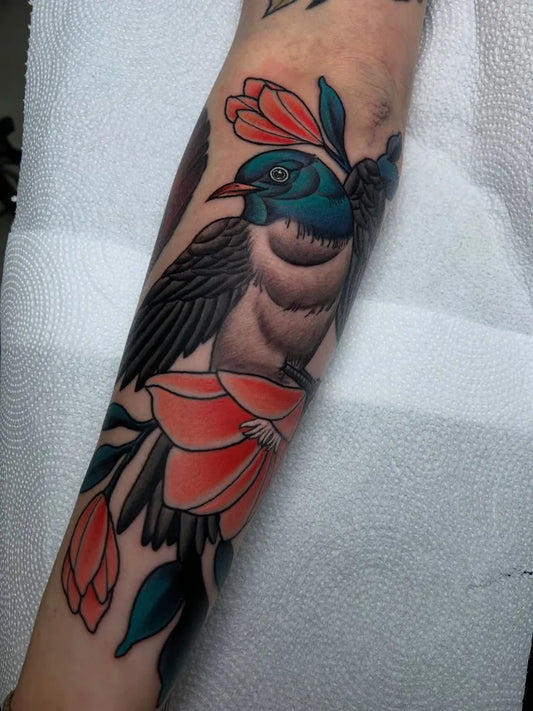 Big Neo Traditional Bluebird and Tulips on Women Arm Tattoo by @tish.tattooer