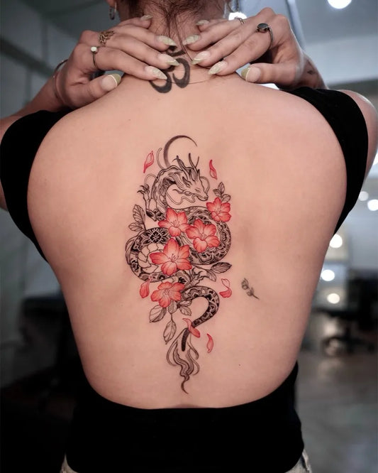 Big Neo Traditional Cherry Blossom Dragon on Women Back Tattoo by @hwana.tt