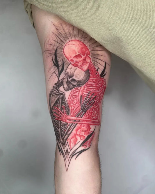 Big Neo Traditional Embracing Skeleton Lovers Tattoo on Men Bicep by @brent_megens