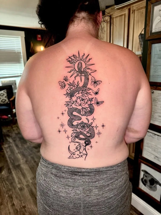Big Neo Traditional Floral Snake on Women Spine Tattoo by @boston.born.ink