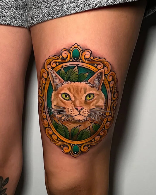 Big Neo Traditional Framed Orange Cat with Leaves on Women Thigh Tattoo by @trevortattooer