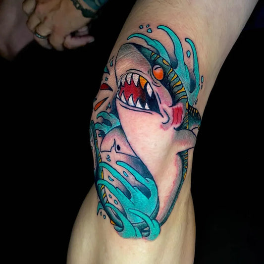Big Neo Traditional Great White Shark with Waves on Women Knee Tattoo by @trentonhtattoos