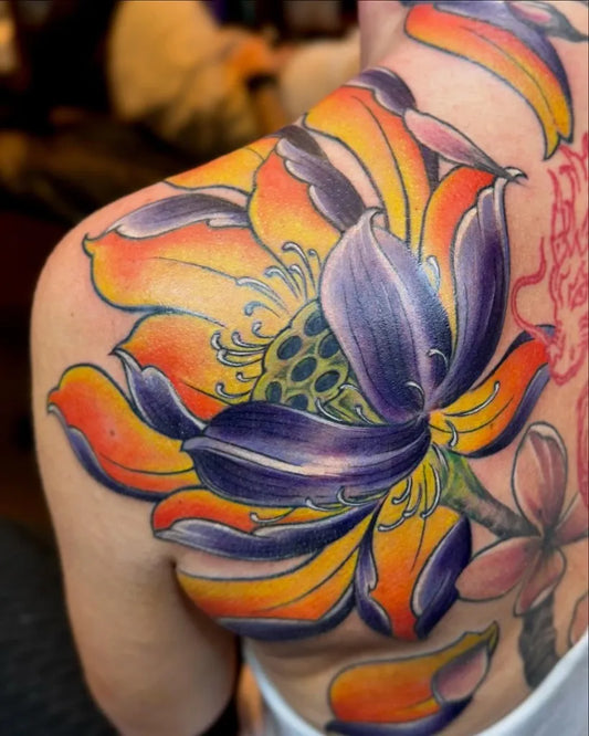 Big Neo Traditional Lotus Flower with Frangipani on Women Shoulder Tattoo by @hekuli.tattoo