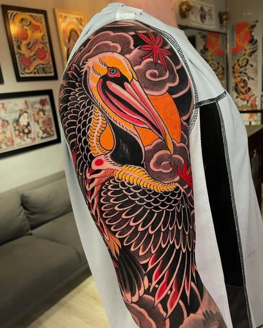 Big Neo Traditional Pelican and Koi on Men Arm Tattoo by @ink.soul.tattoo