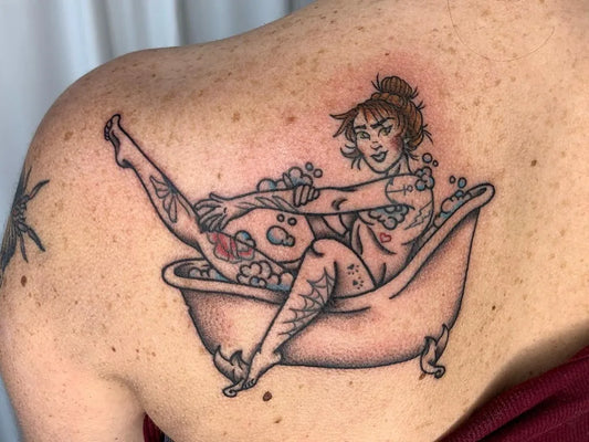 Big Neo Traditional Pin Up Girl Bathtub Tattoo on Women Shoulder by @sunnysidetattoo