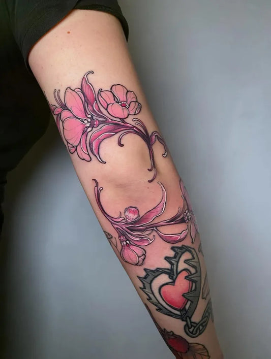 Big Neo Traditional Pink Lilies and Heart on Women Arm Tattoo by @corderosimona