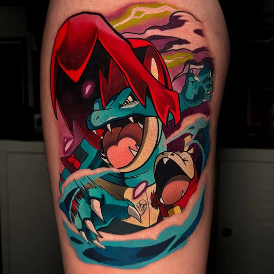 Big Neo Traditional Pokemon Totodile with Trainer Tattoo on Men Arm by @siitattooist