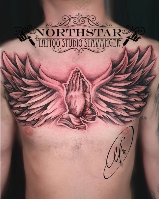 Big Neo Traditional Praying Hands with Wings Tattoo on Men Chest by @northstartattoostavanger