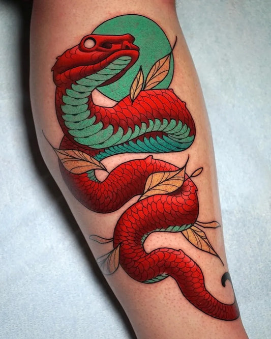 Big Neo Traditional Red Snake with Green Accents and Leaves on Women Leg Tattoo by @doom_tattoo