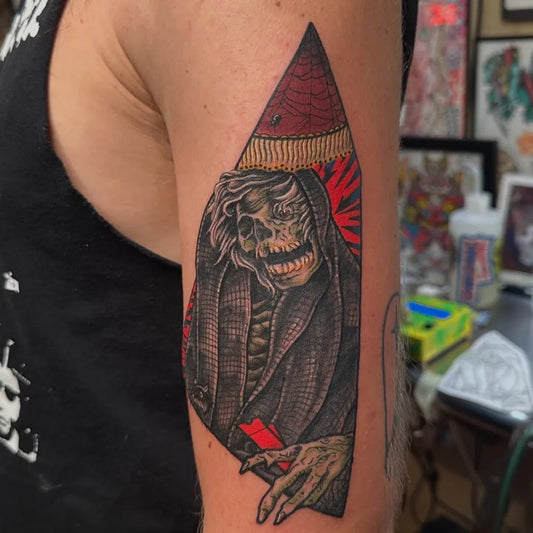 Big Neo Traditional Skull Hooded Figure Horror Tattoo on Men Arm by @coffinfullofslime