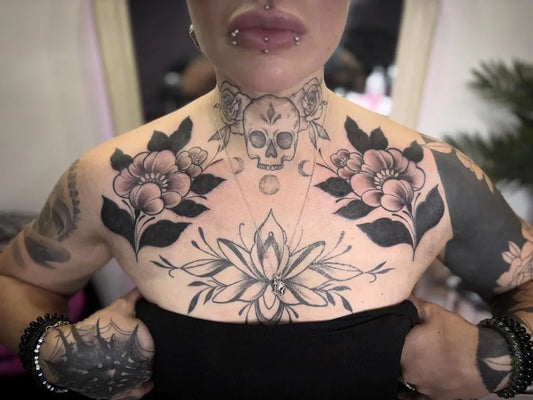 Big Neo Traditional Skull and Flowers on Women Chest Tattoo by @sjpdraws