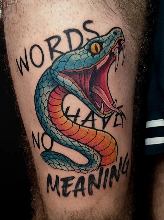 Big Neo Traditional Snake Words on Men Leg Tattoo by @yovel_tattoo