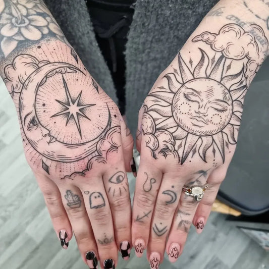 Big Neo Traditional Sun Moon Symbols on Women Hands Tattoo by @beth.sorrows