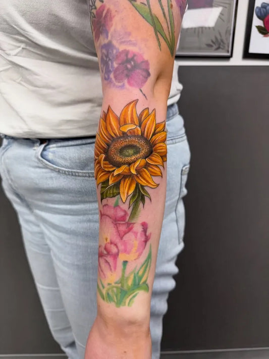 Big Neo Traditional Sunflower and Flowers on Women Arm Tattoo by @carol_cannon_tattoos