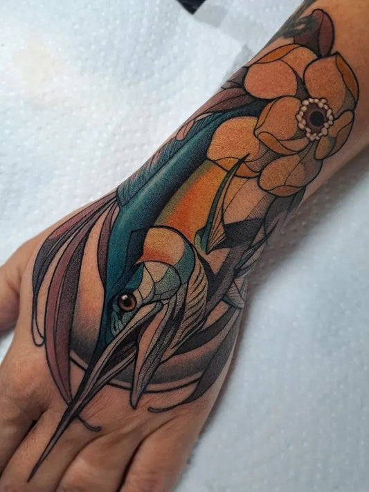 Big Neo Traditional Swordfish and Flowers on Women Wrist Tattoo by @kbn.sensibilitey