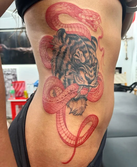 Big Neo Traditional Tiger and Snake Tattoo on Women Rib by @inkduptat2