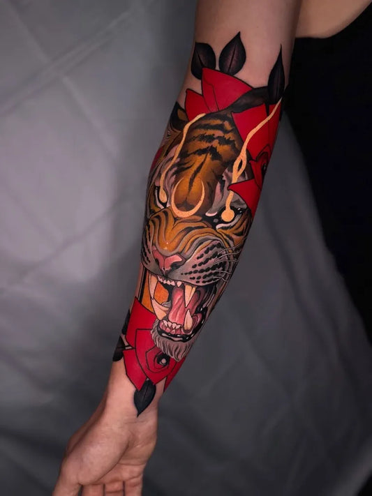 Big Neo Traditional Tiger with Red Eyes and Leaves on Women Arm Tattoo by @rb.tattoo